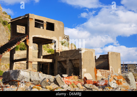 Ruins on the abandoned island of Gunkanjima off the coast of Nagasaki Prefecture, Japan. Stock Photo