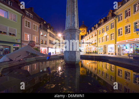 water fountain, old town city gate, Freiburg, Baden-Wurttemberg, Germany, Europe Stock Photo