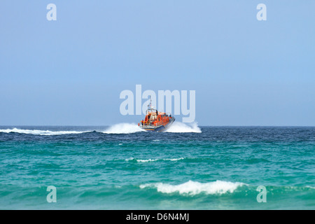 RNLI Sennen Cove, Cornwall. Tamar class All Weather Lifeboat Victor Freeman just after launching to sea in August of 2012. Stock Photo