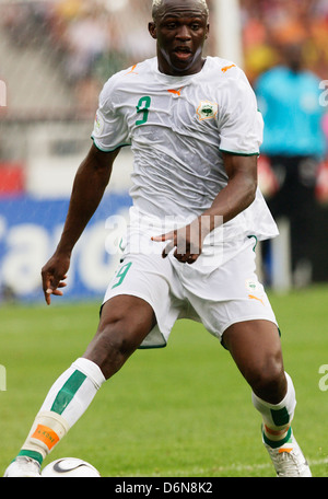 STUTTGART, GERMANY - JUNE 16:  Arouna Kone of Ivory Coast in action during the FIFA World Cup Group C match against Holland at Mercedes-Benz Arena on June 16, 2006 in Stuttgart, Germany. Editorial use only. (Photograph by Jonathan Paul Larsen / Diadem Images) Stock Photo