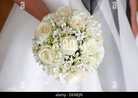 Essen, Germany, a bride with a wedding bouquet, wedding photo icon Stock Photo