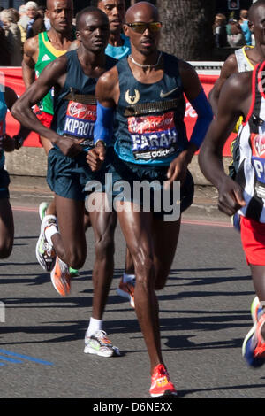 London, UK. 21st April, 2013. Somali-born, British international track and field athlete, Mohamed 'Mo' Farah, CBE, leads the Elite Men at Sun In the Sands Roundabout, Blackheath, UK, during Virgin London Marathon 2013 Stock Photo