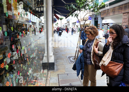 Shoppers in front of a duty free store in Gibraltar Stock Photo