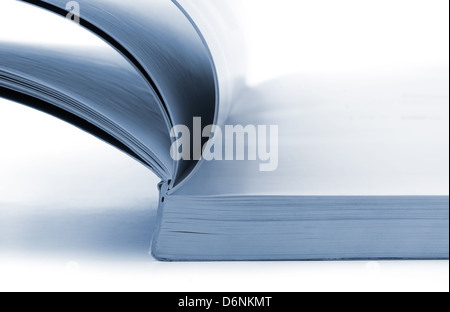 Close up of open catalog on white background Stock Photo