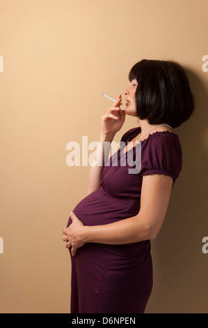Freiburg, Germany, a pregnant woman with a cigarette Stock Photo