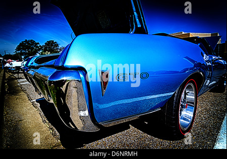 Closeup of back of vintage blue Pontiac GTO muscle car. Stock Photo