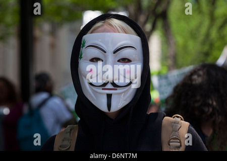 Woman wearing Guy Fawkes mask - USA Stock Photo