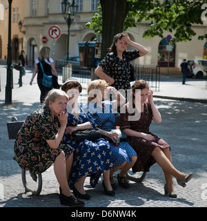 Film extras waiting on location, Prague Stock Photo