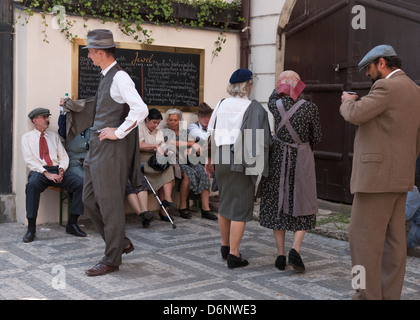 Film extras waiting on location, Prague Stock Photo