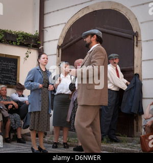 Film extras waiting on location, Prague Stock Photo