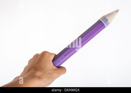 Hand with Giant Pencil Stock Photo