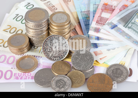 Berlin, Germany, Euro notes, Euromuenzen and former franc coins Stock Photo
