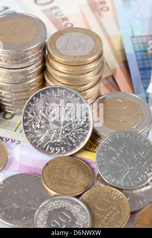 Berlin, Germany, Euro notes, Euromuenzen and former franc coins Stock Photo