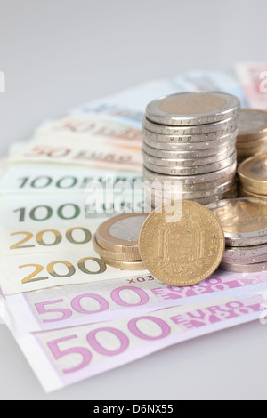 Berlin, Germany, Euro notes, Euromuenzen and former 1-peseta coin Stock Photo