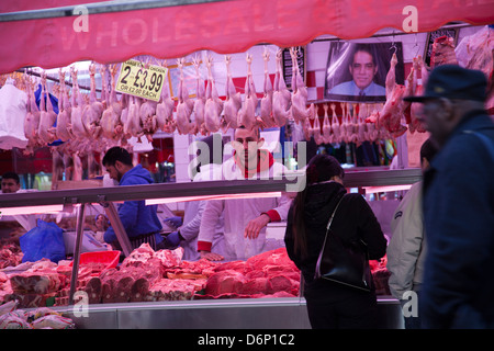 Brixton Outdoor Market in Lambeth, Halal Butcher Outlet - London - UK Stock Photo