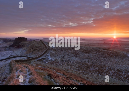 Sunrise and Hadrian's Wall National Trail, Hadrian's Wall, UNESCO World Heritage Site, Northumberland, England, UK Stock Photo