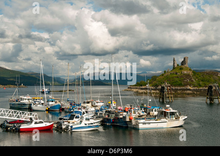 The harbour at Kyleakin, Isle of Skye, Scotland, UK, with the ruined Caisteal Maol behind. Stock Photo