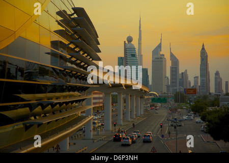 City skyline and Metro Station at sunset, Dubai, United Arab Emirates, Middle East