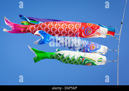 Colourful carp streamers or Koinobori flutter in the wind. Stock Photo