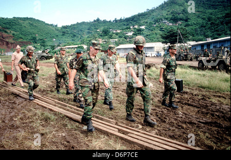 US Chairman of the Joint Chiefs of Staff, General John W. Vessey Jr. tours the battlefield during the Invasion of Grenada, codenamed Operation Urgent Fury November 4, 1983 in St Georges, Grenada. The invasion began on October 25, 1983 and was the first major military action by the United States since the end of the Vietnam War. Stock Photo