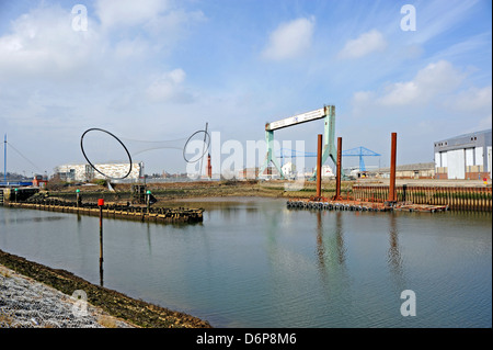 Waterside developement alongside old port cranes at Middlesbrough Cleveland Teeside UK Stock Photo