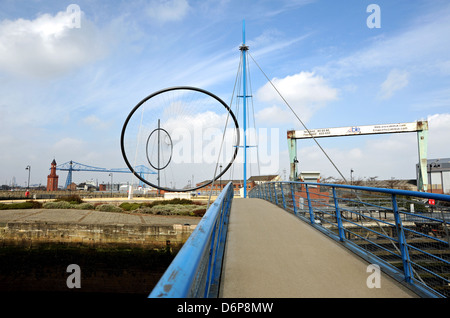 Waterside developement alongside old port cranes at Middlesbrough Cleveland Teeside UK Stock Photo