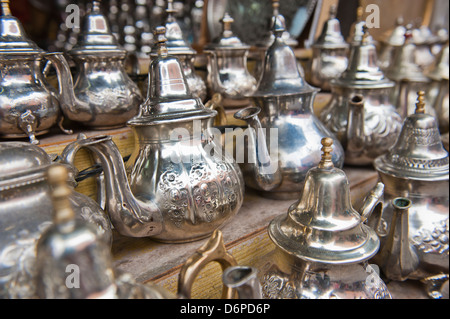 Traditional metal Moroccan mint tea pots for sale in the souks in the old Medina, Marrakech, Morocco, North Africa, Africa Stock Photo