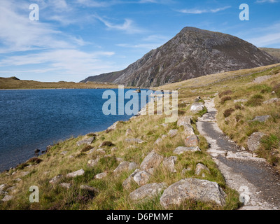 Pen yr Ole Wen's south spur rising steeply beyond Llyn Idwal in Cwm Idwal,  Snowdonia National Park Stock Photo