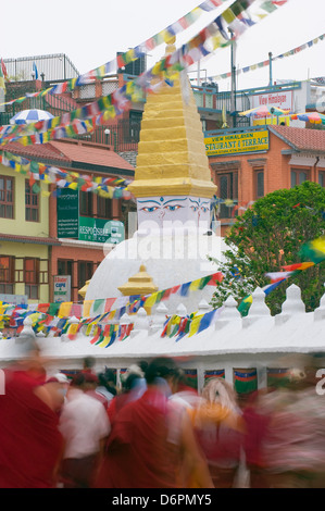 pilgrims circumambulating the Great Stupa, Boudha Stupa, (Chorten Chempo), Boudhanath, Kathmandu, Nepal, Asia Stock Photo