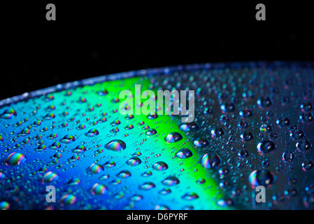 close up of water droplets on a cd, dvd disk Stock Photo