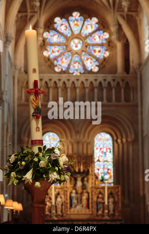 Candle in Christ Church College cathedral decorated for Maundy Thursday visit by Queen in 2013. Oxford, Oxfordshire, England, UK, Britain Stock Photo