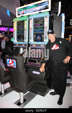 Actor Dan Aykroyd unveils Ghostbusters slot machine and cuts ribbon at The Global Gaming Expo 2011 held at the Sands Convention Stock Photo