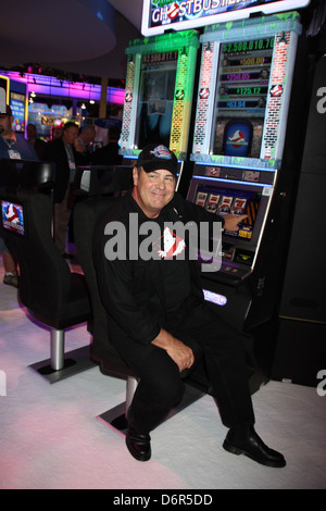 Actor Dan Aykroyd unveils Ghostbusters slot machine and cuts ribbon at The Global Gaming Expo 2011 held at the Sands Convention Stock Photo