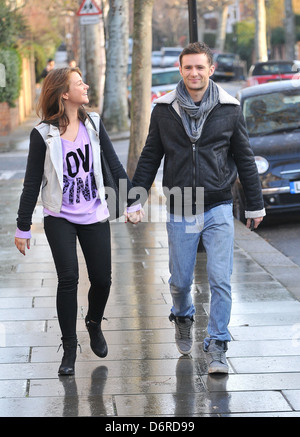 Harry Judd and girlfriend Izzy Johnston arriving at Fearne Cotton's house for her Christmas Party London, England - 22.12.11 Stock Photo