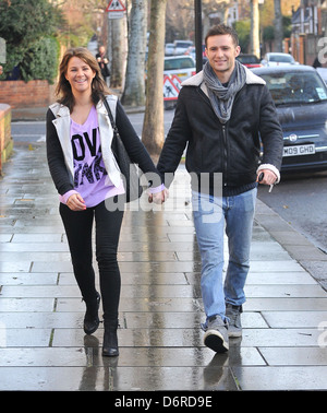 Harry Judd and girlfriend Izzy Johnston arriving at Fearne Cotton's house for her Christmas Party London, England - 22.12.11 Stock Photo