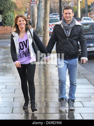 Harry Judd and girlfriend Izzy Johnston arriving at Fearne Cotton's house for her Christmas Party London, England - 22.12.11 Stock Photo