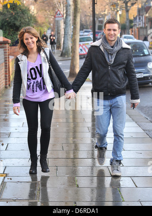 Harry Judd and girlfriend Izzy Johnston arriving at Fearne Cotton's house for her Christmas Party London, England - 22.12.11 Stock Photo