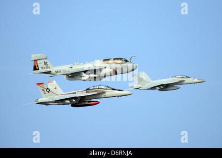 US Navy EA-6B Prowler and F/A-18F Super Hornet aircraft from the aircraft carrier USS John C. Stennis fly in formation April 23, 2013 in the Pacific Ocean. Stock Photo