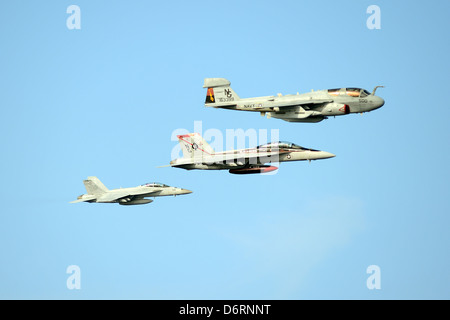 US Navy EA-6B Prowler and F/A-18F Super Hornet aircraft from the aircraft carrier USS John C. Stennis fly in formation April 23, 2013 in the Pacific Ocean. Stock Photo