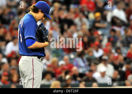 Anaheim, California, USA. 22nd April, 2013. Texas' Derek Holland #45 during the Major League Baseball game between the Texas Rangers and the Los Angeles Angels of Anaheim at Angel Stadium in Anaheim, California. Josh Thompson/Cal Sport Media/Alamy Live News Stock Photo