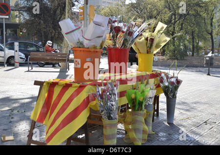 Barcelona, Spain. 23rd April, 2013. The celebration of Saint George is one of the most important festivals of Catalonia and Barcelona. Tradition dictates giving roses for women and books for men but in recent times given away both interchangeably. It is also the day of love in Catalunya and the day when Cervantes & Shakespeare died. Stock Photo