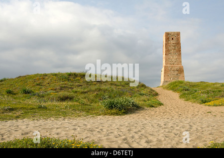 Moorish lookout tower, Thieves Tower, at beach Cabopino near Marbella, Andalusia, Spain. Stock Photo