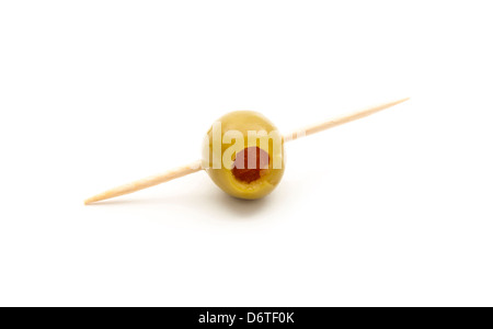 green olive with toothpick isolated on white background Stock Photo