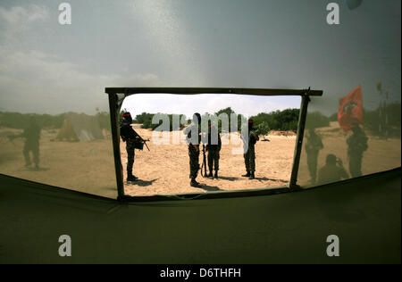 April 23, 2013 - Rafah, Gaza Strip, Palestinian Territory - Palestinian militants from the National Resistance Brigades the armed wing of the Democratic Front for the Liberation of Palestine, take position during a military exercise refresher in Rafah town in the souther west of Gaza strip on, April 23, 2013  (Credit Image: © Eyad Al Baba/APA Images/ZUMAPRESS.com) Stock Photo