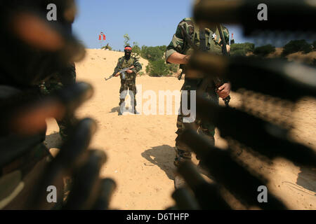 April 23, 2013 - Rafah, Gaza Strip, Palestinian Territory - Palestinian militants from the National Resistance Brigades the armed wing of the Democratic Front for the Liberation of Palestine, take position during a military exercise refresher in Rafah town in the souther west of Gaza strip on, April 23, 2013  (Credit Image: © Eyad Al Baba/APA Images/ZUMAPRESS.com) Stock Photo