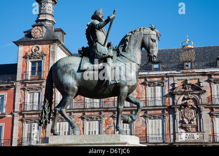 Madrid - Plaza Mayor in morning light with the statue of Philips III and Casa de la Panaderia in March 9, 2013 in Spain. Stock Photo