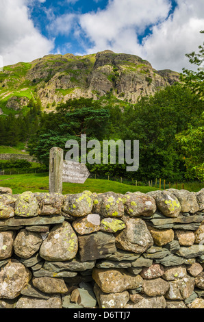 Bridleway sign at the foot of Langdale Fell in the Lake District National Park, Cumbria, England. Stock Photo