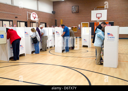 People vote in cardboard voting booths at a polling station in Boise, Idaho, USA. Stock Photo