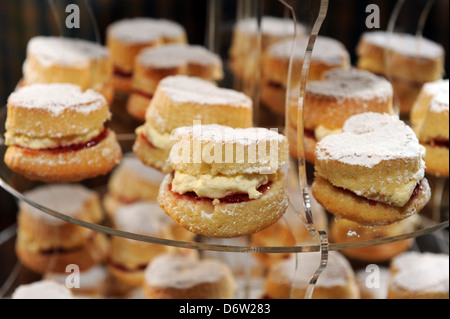 Mini Victoria sponge cakes filled with cream and jam, for a wedding cake. Stock Photo