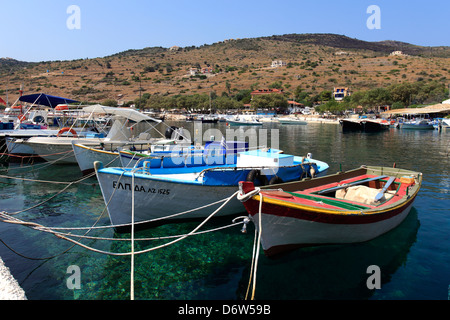 View over fishing boats in the harbour at St Nicholas village, ( St Nicks ), Zakynthos Island, Zante, Greece, Europe. Stock Photo